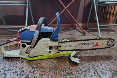 Конфісковане майно за рішенням суду : бензопила марки "ZOMAX ZM 5050" б/в