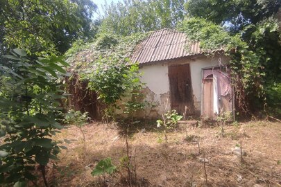 9/100 частки житлового будинку з господарськими спорудами, загальною пл. 150, 6 кв.м. за адресою: Вінницька обл., Вінницький р., смт. Вороновиця, вул. Козацький шлях, 44