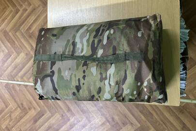 Конфіскація згідно постанови суду: одне пончо проти тепловізійних пристроїв пультом без марки, вживане