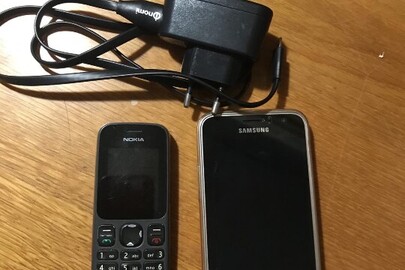 Мобільний телефон марки «SAMSUNG Galaxy Grand Prime» з 2-ма наявними сім-картами №+380631946206 та №+380961173920, б/в, мобільний телефон марки «NOKIA 101», б/в та зарядний пристрій з написом “SAMSUNG”