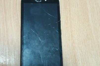 Мобільний телефон марки TECNO, чорного кольору, б/в