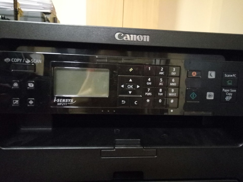 Принтер марки Canon MF211