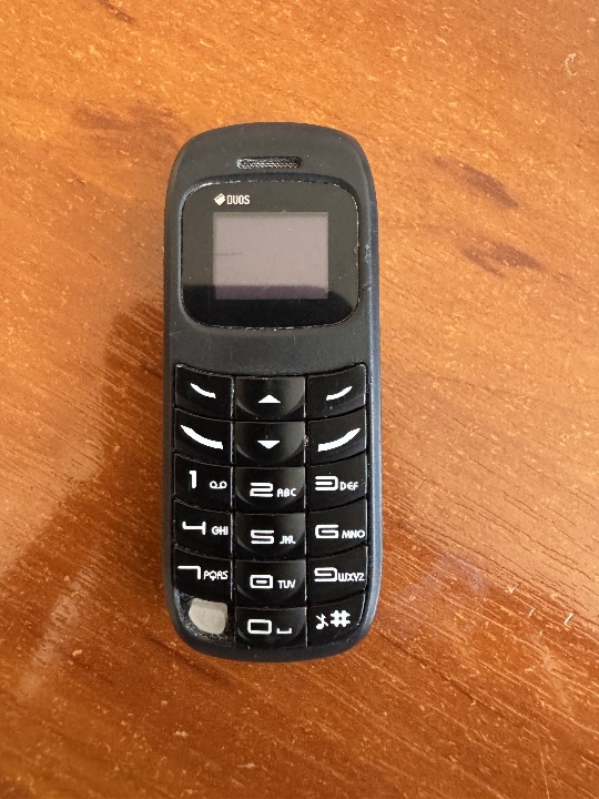 Конфісковане майно: Мобільний телефон марки «mini Phone», модель «BM70» в корпусі чорного кольору, ІMEI №1: 355180020002805; ІMEI №2: 355180020002813, б/в.