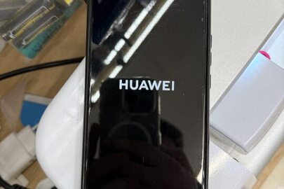 Конфісковане майно за рішенням суду: мобільний телефон марки "Huawei" із ІМЕІ:864085041566510 із сім-картою "Київстар" 0689542023, б/в