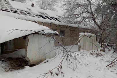 Будівля складу обладнання техпереробки з навісом загальною площею 515,9 м.кв., що знаходиться за адресою: Хмельницька область, Новоушицький район, селище Загродське (Комунар), провулок Центральний,8-В