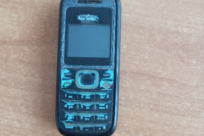 Мобільний телефон марки “Nokia” ІМЕІ:358628013938713 з сім-картою мобільного оператора ПрАТ "ВФ Україна" містить потертості корпусу, бувший у використанні