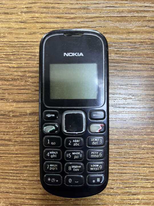 Конфіскація майна за рішенням суду: мобільний телефон марки NOKIA модель 1280, ІМЕІ: 355188/05/734587/2, чорного кольору, в робочому стані, з ознаками використання