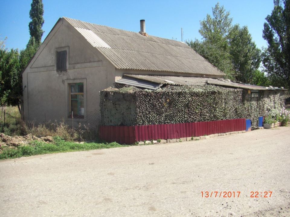 ІПОТЕКА. Адміністративна будівля, загальною площею 39.7 кв.м. та земельна ділянка, площею 0.0100 га, кадастровий номер 6523255100:02:006:0020, що знаходяться за адресою: Херсонська обл., Каланчацький р-н, смт. Каланчак, вул. Калініна, 56