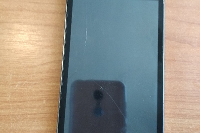 Мобільний телефон марки "DODGEE" model X5 MAX Pro, IMEI1: 352691081476954; IMEI2: 352691081476962 та акумуляторну батарею до нього