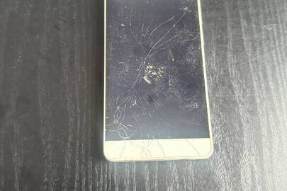 Конфісковане майно за вироком суду, мобільний телефон марки "Bravis" білого кольору б/в