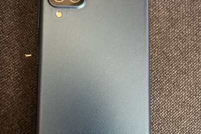 Конфіскація за рішенням суду : мобільний телефон марки "Samsung А12" ІМЕІ1:352307132980841, ІМЕІ2:2356449142980845 ( б/в)