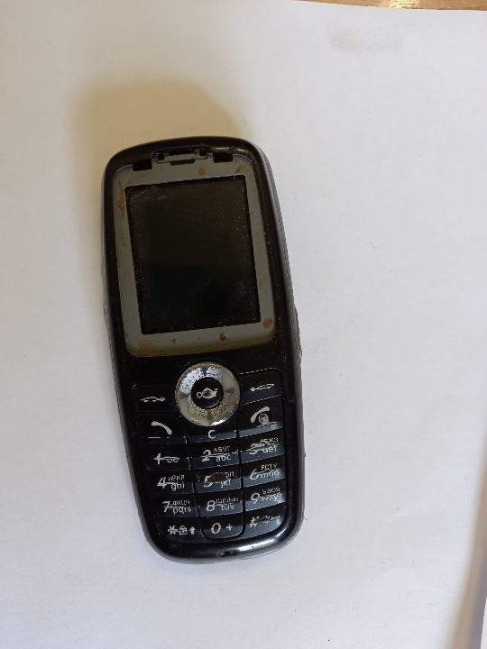 Мобільний телефон чорного кольору, б/в, 1 од.