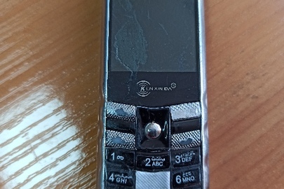 Мобільний телефон торгової марки «KEN XIN DA» з серійними номерами IMEI-1: 865584013127425, IMEI-2: 865584013157411
