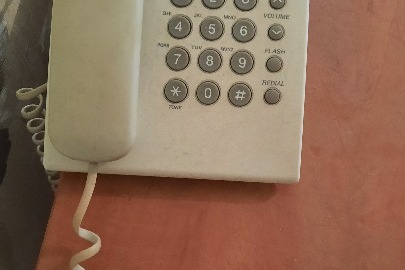 Телефон "Panasonic", білого кольору, 1 шт, б/в