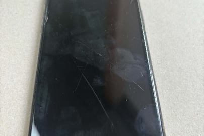 Конфісковане майно за рішенням суду: мобільний телефон Iphone XS, був у використанні, зарядний пристрій відсутній