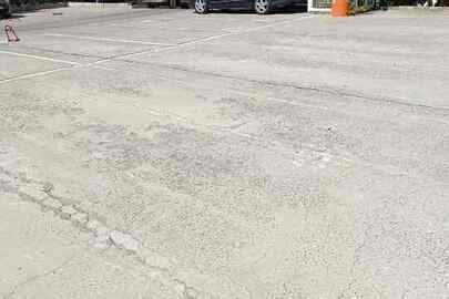 1/2 частина машиномісця № 190, загальною площею 12,4 кв.м. за адресою: м. Одеса, вул. Академіка Сахарова, 36А