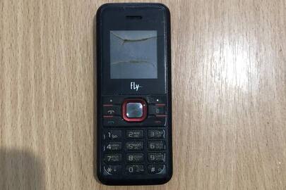 Мобільний телефон марки "Fly ds105”, бувший у вжитку