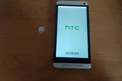 Мобільний телефон б/в HTC ONE M7 Silver та сім карта оператора Life 0931144325