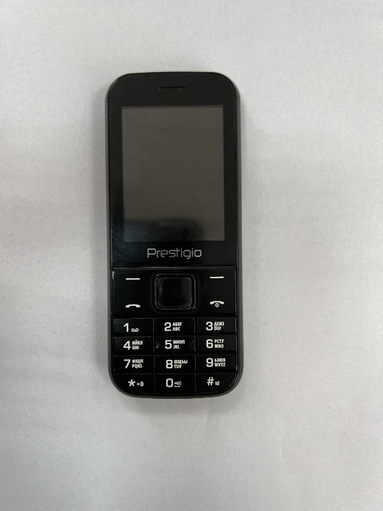 Мобільний телефон марки Prestigio, модель Wize C1 PFP1240DUO, б/в