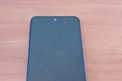 Конфіскація майна за рішенням суду: мобільний телефон "Xiaomi Hyper OS Redmi Note 12 S", світло-блактиного кольору, IMEI 1: 860364062150387/78, IMEI 2: 860364062150395/78,  б/в