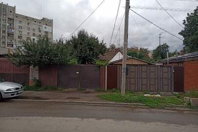 39/100 частки житлового будинку з надвірними будівлями, загальною площею 238,8 кв.м., за адресою: м. Харків, вул. Спартака, буд. 24а