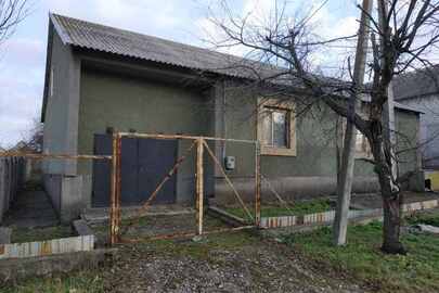 Іпотека. Домоволодіння заг. площ. 171.2 кв.м., та зем. діл. к.н. 1210400000:01:016:0064, площ. 0.0701 га, за адресою: Дніпропетровська обл., м. Кам'янське, вул. Луференко, буд. 12