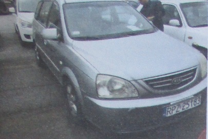 Транспортний засіб марки Kia Carens, 2003 року випуску, реєстраційний номер RPZ25183, № куз. KNEFC524135223005, сірого кольору, об'єм двигуна - 1991 см.куб., дизель