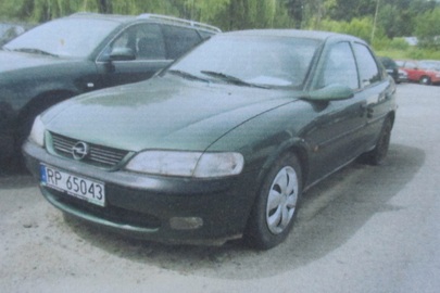 Транспортний засіб марки OPEL VECTRA, 1996 року випуску, реєстраційний номер RP65043, № куз. W0L000038Т7522169, сірого кольору, об'єм двигуна - 1598 см. куб., бензин