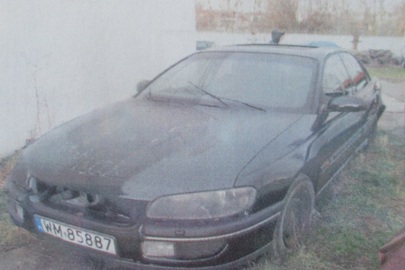 Транспортний засіб марки OPEL OMEGA, легковий седан-В, 1999 року випуску, реєстраційний номер WM85887, № куз. WOL0VBM69X1042982, чорного кольору, об'єм двигуна - 1998 см. куб.