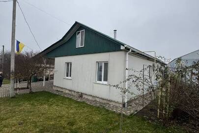 Житловий будинок заг. пл. 98.2 кв.м., жит. пл. 48.5 кв.м., та земельна ділянка, заг. пл. 0.3775 га, К/Н: 7120983000:01:001:0318, за адресою: Черкаська обл., Уманський р., с. Конельська Попівка, вул. Молодіжна, буд. 60