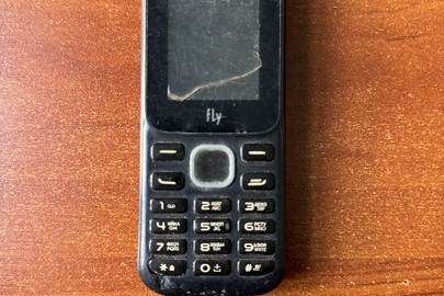 Мобільний телефон марки "Fly", чорного кольору, б/в