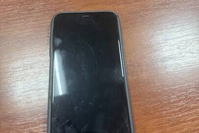 Конфісковане майно за вироком суду: мобільний телефон з назвою  "Iphone 11", в корпусі сірого кольору, в чохлі сірого кольору, б/в
