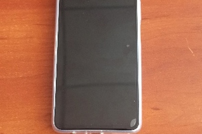 Мобільний телефон марки "TechnoCamon" з сім карткою та чохлом, бувший у використанні 