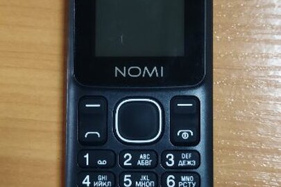 Мобільний телефон "Nomi" чорного кольору, IMEI 1:357876104084803; IMEI 2:357876104084795, б/в