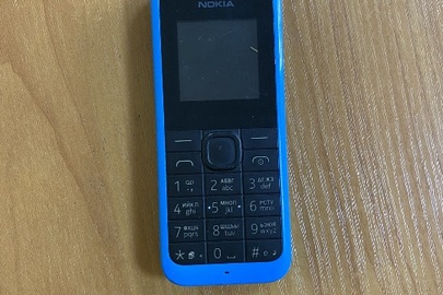 Мобільний телефон «Nokia» ІМЕІ 1: 1357289081231142,  ІМЕІ 2: 357289081231159, блакитного кольору, б/в