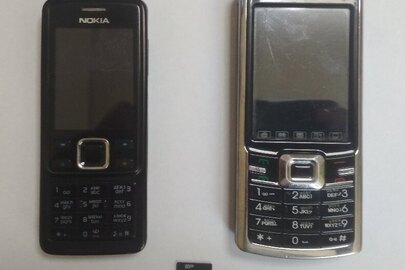 Мобільний телефон "Nokia", мобільний телефон «Моторола» та флеш карта об’ємом 2ГБ