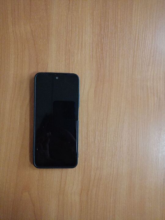 Мобільний телефон марки “Redmi”  чорного кольору б/в