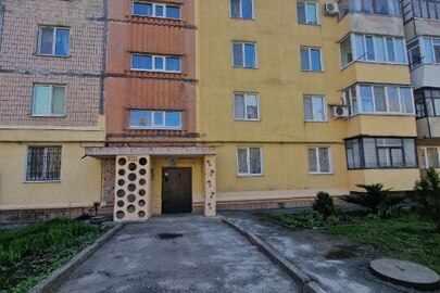 1/3 трикімнатної квартири, загальною площею 68,64 кв.м., за адресою: м. Запоріжжя, вул. Військбуд, буд. 100, кв. 28