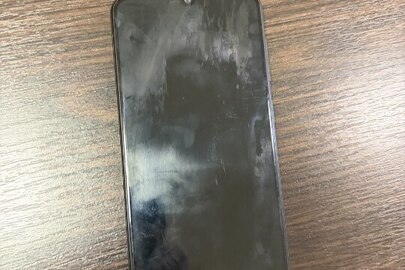 Конфісковане майно за рішенням суду: мобільний телефон чорного кольору марки "SAMSUNG" моделі "Galaxy А30", б/в