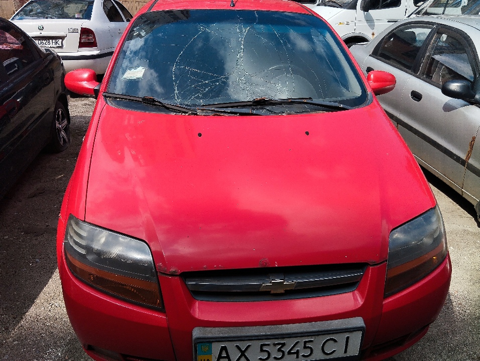 Автомобіль Сhevrolet Aveo , реєстраційний номер АХ5345СІ, 2005 р.в., VIN KL1SF69YE6B560778, червоного кольору