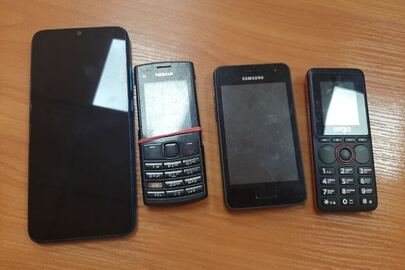 Мобільний телефон марки «Nokia», IMEI 1:355207/05/998552/5, IMEI 2:355207/05/998553/3; Мобільний телефон марки «Samsung», IMEI 358845/04/147107/1; Мобільний телефон марки «ERGO», IMEI встановити не вдалось; Мобільний телефон марки «REDMI», модель: М2006CIG