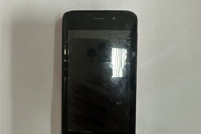 Мобільний телефон червоного кольору, марки MEDIAKOM , б/в
