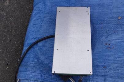 Конфіскація майна за ухвалою суду: Блок живлення відеокамер "AC/DC ADAPTER", бувший у використанні, технічний стан не перевірявся