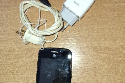 Конфіскація майна за виконавчим листом: мобільний телефон марки "FLY" чорного кольору, IMEI встановити не вдалось; два зарядні пристрої до нього, б/в