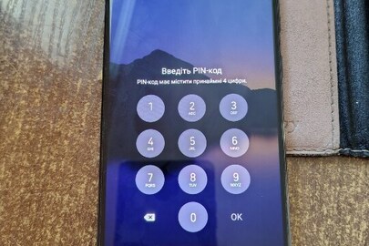 Конфіскація майна за ухвалою суду : мобільний телефон б/в марки Samsung