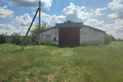 Нежитлова будівля, склад, загальною площею 1042,7 кв.м, місцезнаходження: Одеська обл., Березівський р., с. Новокальчеве, вулиця Миру, будинок 25