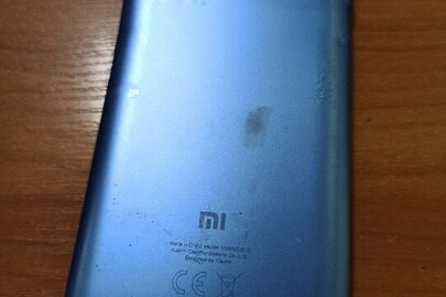 Конфіскація майна за рішенням суду: мобільний телефон марки Xiaomi б/в