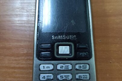 Конфіскація майна за рішенням суду: мобільний телефон марки Samsung б/в