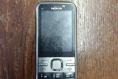 Конфіскація майна за рішенням суду: телефон марки NOKIA C5, б/в
