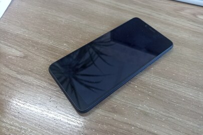 Конфіскація майна за рішенням суду: мобільний телефон марки "Xiaomi Redmi 6a" з сім-картою абонентського номеру "0992029688, б/в 